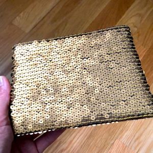 Gold sequin clutch